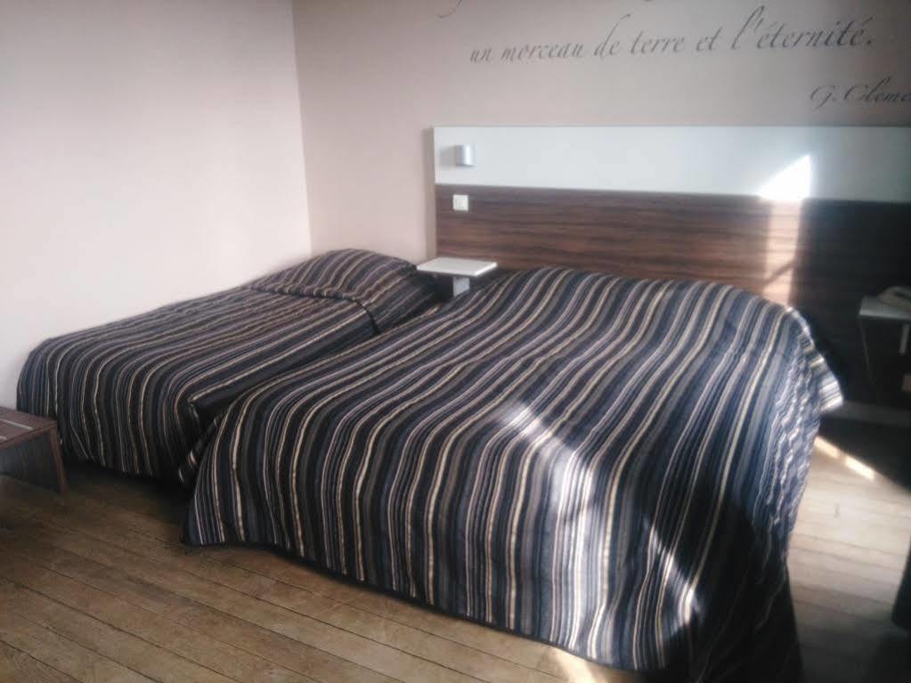 Logis Hotel & Restaurant - Les Bords De Seine ลาโรช-กูยง ภายนอก รูปภาพ