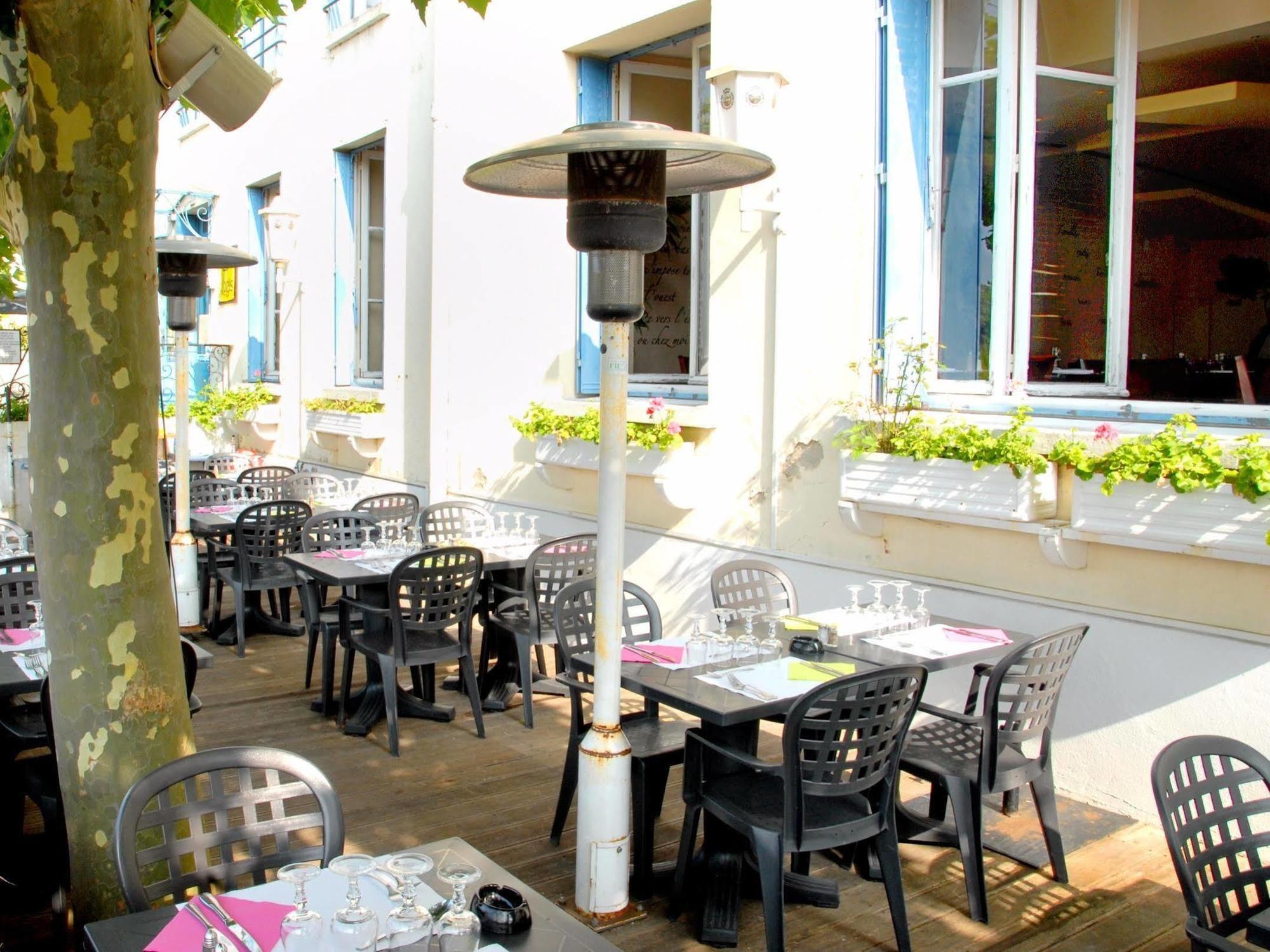 Logis Hotel & Restaurant - Les Bords De Seine ลาโรช-กูยง ภายนอก รูปภาพ